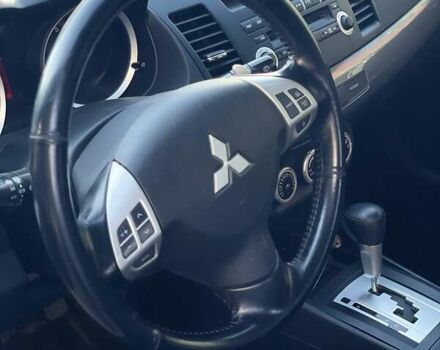 Мицубиси Лансер 2008 в Днепре (Днепропетровске) на Automoto.ua Белый Мицубиси Лансер, объемом двигателя 1.8 л и пробегом 185 тыс. км за 8500 $, фото 14 на Automoto.ua