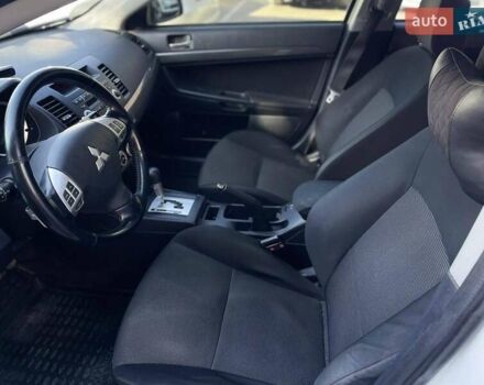 Мицубиси Лансер 2008 в Днепре (Днепропетровске) на Automoto.ua Белый Мицубиси Лансер, объемом двигателя 1.8 л и пробегом 185 тыс. км за 8500 $, фото 10 на Automoto.ua