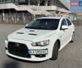 Белый Мицубиси Лансер, объемом двигателя 2 л и пробегом 154 тыс. км за 8900 $, фото 7 на Automoto.ua