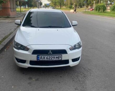 Білий Міцубісі Lancer, об'ємом двигуна 1.8 л та пробігом 230 тис. км за 6500 $, фото 4 на Automoto.ua