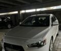 Білий Міцубісі Lancer, об'ємом двигуна 2 л та пробігом 215 тис. км за 6500 $, фото 1 на Automoto.ua
