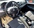 Белый Мицубиси Лансер, объемом двигателя 1.8 л и пробегом 238 тыс. км за 6000 $, фото 9 на Automoto.ua