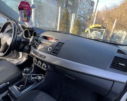Білий Міцубісі Lancer, об'ємом двигуна 1.8 л та пробігом 225 тис. км за 5000 $, фото 17 на Automoto.ua