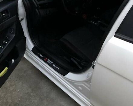 Белый Мицубиси Лансер, объемом двигателя 1.8 л и пробегом 215 тыс. км за 7000 $, фото 14 на Automoto.ua