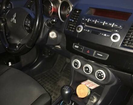 Белый Мицубиси Лансер, объемом двигателя 1.8 л и пробегом 215 тыс. км за 7000 $, фото 9 на Automoto.ua