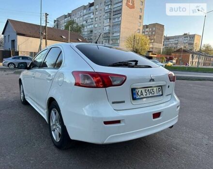 Білий Міцубісі Lancer, об'ємом двигуна 1.8 л та пробігом 262 тис. км за 6500 $, фото 19 на Automoto.ua