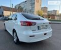 Білий Міцубісі Lancer, об'ємом двигуна 1.8 л та пробігом 262 тис. км за 6500 $, фото 19 на Automoto.ua