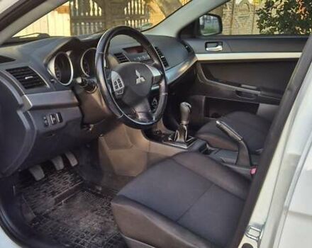 Білий Міцубісі Lancer, об'ємом двигуна 1.5 л та пробігом 154 тис. км за 8700 $, фото 18 на Automoto.ua
