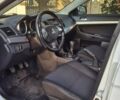 Білий Міцубісі Lancer, об'ємом двигуна 1.5 л та пробігом 154 тис. км за 8700 $, фото 18 на Automoto.ua