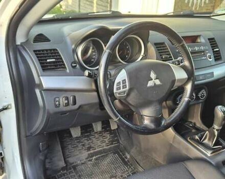 Білий Міцубісі Lancer, об'ємом двигуна 1.5 л та пробігом 154 тис. км за 8700 $, фото 19 на Automoto.ua