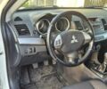 Білий Міцубісі Lancer, об'ємом двигуна 1.5 л та пробігом 154 тис. км за 8700 $, фото 19 на Automoto.ua