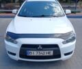 Белый Мицубиси Лансер, объемом двигателя 1.8 л и пробегом 168 тыс. км за 6999 $, фото 1 на Automoto.ua