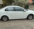 Білий Міцубісі Lancer, об'ємом двигуна 1.8 л та пробігом 147 тис. км за 7070 $, фото 1 на Automoto.ua