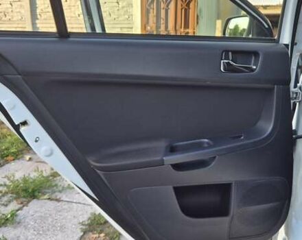 Білий Міцубісі Lancer, об'ємом двигуна 1.5 л та пробігом 154 тис. км за 8700 $, фото 23 на Automoto.ua