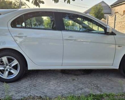Білий Міцубісі Lancer, об'ємом двигуна 1.5 л та пробігом 154 тис. км за 8700 $, фото 11 на Automoto.ua