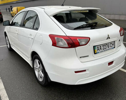 Белый Мицубиси Лансер, объемом двигателя 1.8 л и пробегом 258 тыс. км за 6100 $, фото 6 на Automoto.ua