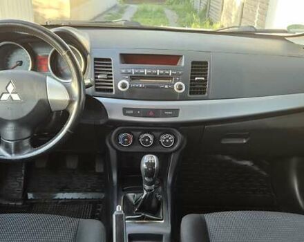 Білий Міцубісі Lancer, об'ємом двигуна 1.5 л та пробігом 154 тис. км за 8700 $, фото 31 на Automoto.ua