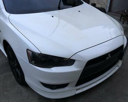 Белый Мицубиси Лансер, объемом двигателя 1.8 л и пробегом 215 тыс. км за 7000 $, фото 12 на Automoto.ua