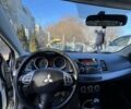 Білий Міцубісі Lancer, об'ємом двигуна 1.8 л та пробігом 225 тис. км за 5000 $, фото 7 на Automoto.ua