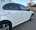 Білий Міцубісі Lancer, об'ємом двигуна 1.8 л та пробігом 262 тис. км за 6500 $, фото 13 на Automoto.ua