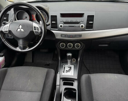 Белый Мицубиси Лансер, объемом двигателя 1.8 л и пробегом 258 тыс. км за 6100 $, фото 3 на Automoto.ua