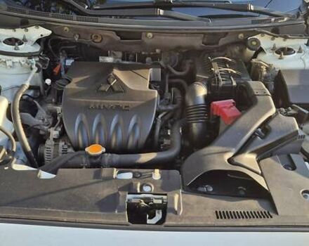 Білий Міцубісі Lancer, об'ємом двигуна 1.5 л та пробігом 154 тис. км за 8700 $, фото 35 на Automoto.ua