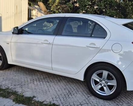 Білий Міцубісі Lancer, об'ємом двигуна 1.5 л та пробігом 154 тис. км за 8700 $, фото 2 на Automoto.ua