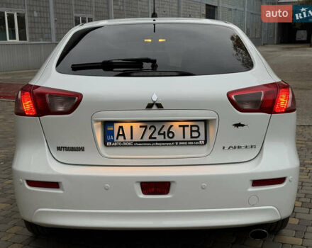 Мицубиси Лансер 2010 в Броварах на Automoto.ua Белый Мицубиси Лансер, объемом двигателя 1.8 л и пробегом 160 тыс. км за 7600 $, фото 10 на Automoto.ua