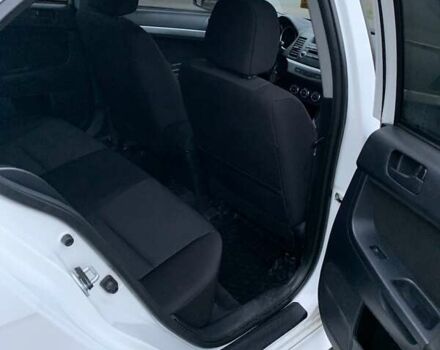 Белый Мицубиси Лансер, объемом двигателя 1.8 л и пробегом 214 тыс. км за 7000 $, фото 13 на Automoto.ua