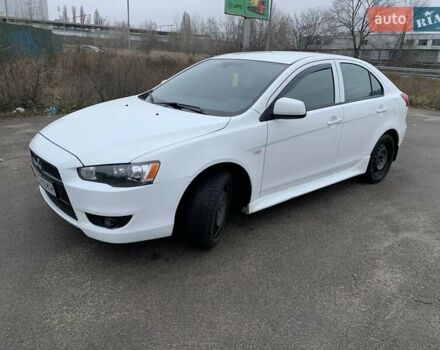 Белый Мицубиси Лансер, объемом двигателя 1.8 л и пробегом 214 тыс. км за 7000 $, фото 1 на Automoto.ua