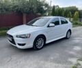 Білий Міцубісі Lancer, об'ємом двигуна 1.8 л та пробігом 228 тис. км за 4990 $, фото 1 на Automoto.ua