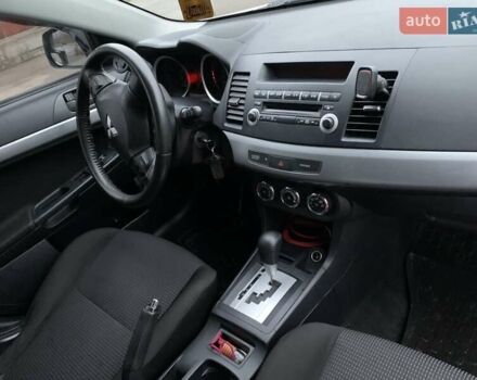 Белый Мицубиси Лансер, объемом двигателя 1.8 л и пробегом 214 тыс. км за 7000 $, фото 11 на Automoto.ua