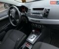 Белый Мицубиси Лансер, объемом двигателя 1.8 л и пробегом 214 тыс. км за 7000 $, фото 11 на Automoto.ua