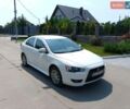 Білий Міцубісі Lancer, об'ємом двигуна 1.8 л та пробігом 228 тис. км за 5500 $, фото 1 на Automoto.ua