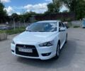 Білий Міцубісі Lancer, об'ємом двигуна 1.8 л та пробігом 228 тис. км за 4900 $, фото 1 на Automoto.ua