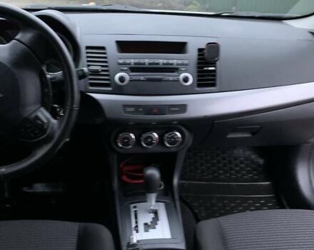 Белый Мицубиси Лансер, объемом двигателя 1.8 л и пробегом 214 тыс. км за 7000 $, фото 15 на Automoto.ua