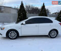 Білий Міцубісі Lancer, об'ємом двигуна 1.8 л та пробігом 173 тис. км за 6200 $, фото 4 на Automoto.ua