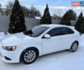 Білий Міцубісі Lancer, об'ємом двигуна 1.8 л та пробігом 173 тис. км за 6200 $, фото 3 на Automoto.ua