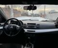 Білий Міцубісі Lancer, об'ємом двигуна 1.8 л та пробігом 173 тис. км за 6200 $, фото 15 на Automoto.ua