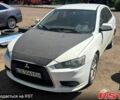 Білий Міцубісі Lancer, об'ємом двигуна 1.8 л та пробігом 247 тис. км за 5400 $, фото 1 на Automoto.ua