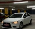 Белый Мицубиси Лансер, объемом двигателя 1.6 л и пробегом 208 тыс. км за 6400 $, фото 1 на Automoto.ua