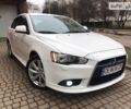 Білий Міцубісі Lancer, об'ємом двигуна 1.8 л та пробігом 168 тис. км за 9900 $, фото 1 на Automoto.ua