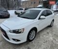 Білий Міцубісі Lancer, об'ємом двигуна 1.8 л та пробігом 154 тис. км за 9950 $, фото 16 на Automoto.ua