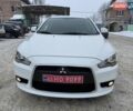 Білий Міцубісі Lancer, об'ємом двигуна 1.8 л та пробігом 154 тис. км за 9950 $, фото 2 на Automoto.ua