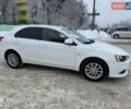 Білий Міцубісі Lancer, об'ємом двигуна 1.8 л та пробігом 154 тис. км за 9950 $, фото 5 на Automoto.ua