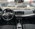 Білий Міцубісі Lancer, об'ємом двигуна 1.8 л та пробігом 154 тис. км за 9950 $, фото 27 на Automoto.ua
