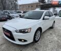 Білий Міцубісі Lancer, об'ємом двигуна 1.8 л та пробігом 154 тис. км за 9950 $, фото 1 на Automoto.ua