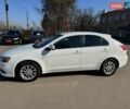 Білий Міцубісі Lancer, об'ємом двигуна 1.8 л та пробігом 154 тис. км за 9750 $, фото 13 на Automoto.ua