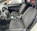 Білий Міцубісі Lancer, об'ємом двигуна 1.8 л та пробігом 154 тис. км за 9950 $, фото 24 на Automoto.ua