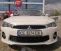 Білий Міцубісі Lancer, об'ємом двигуна 0.24 л та пробігом 62 тис. км за 10800 $, фото 1 на Automoto.ua